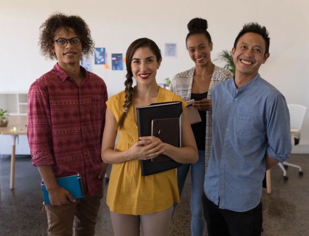 portrait-of-diverse-business-colleagues-smiling-an-2023-11-27-05-33-36-utc (1)